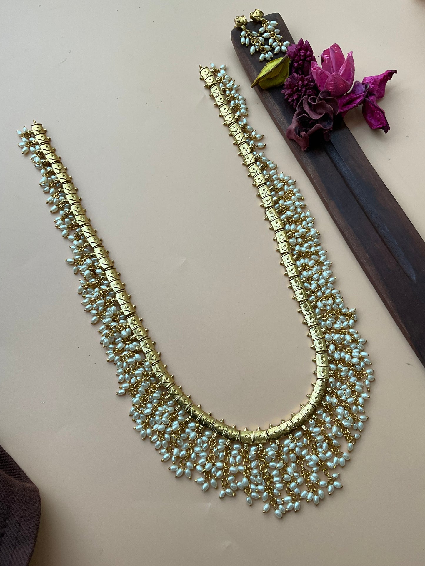 Rice pearls layered long harm