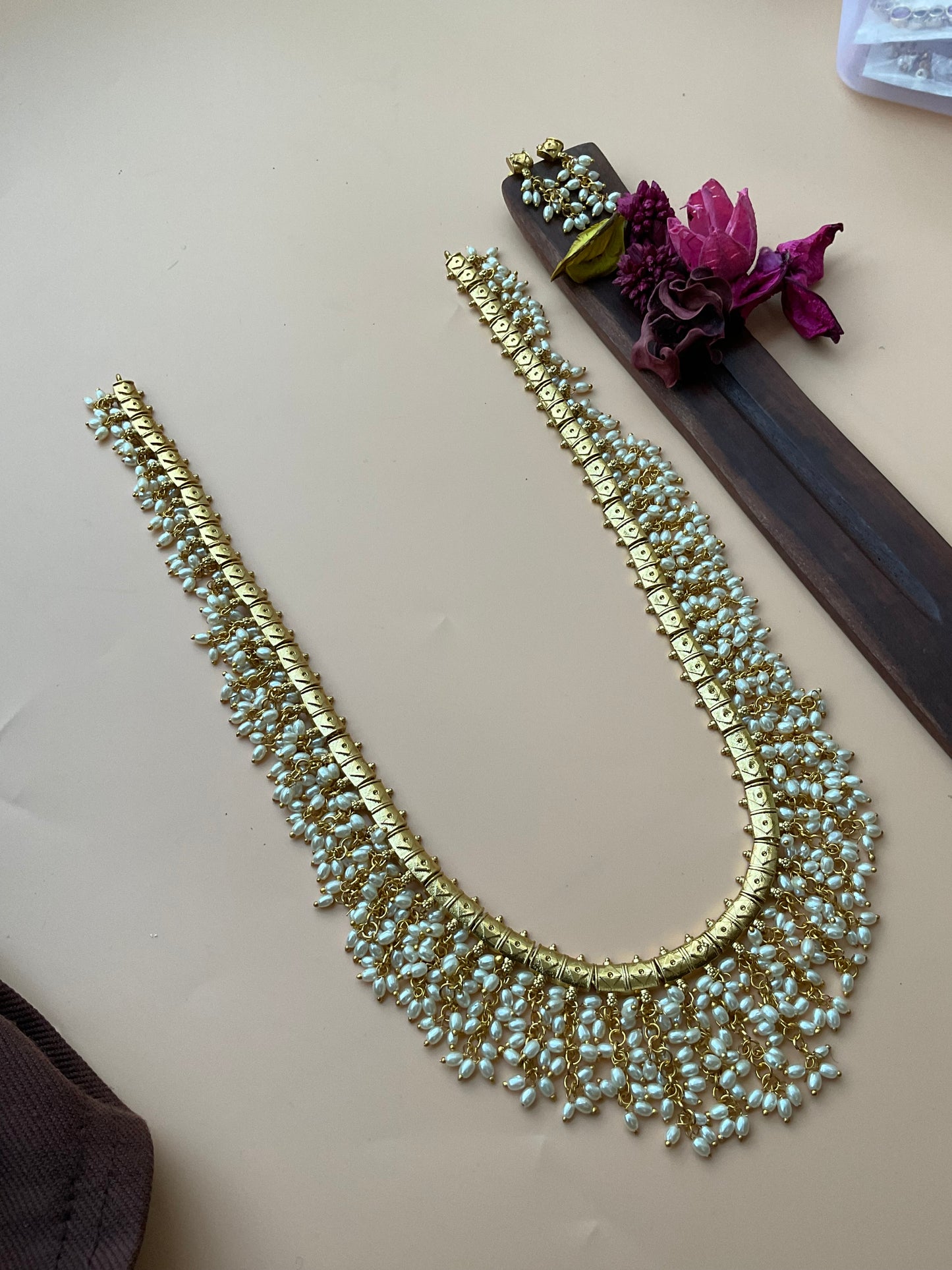 Rice pearls layered long harm