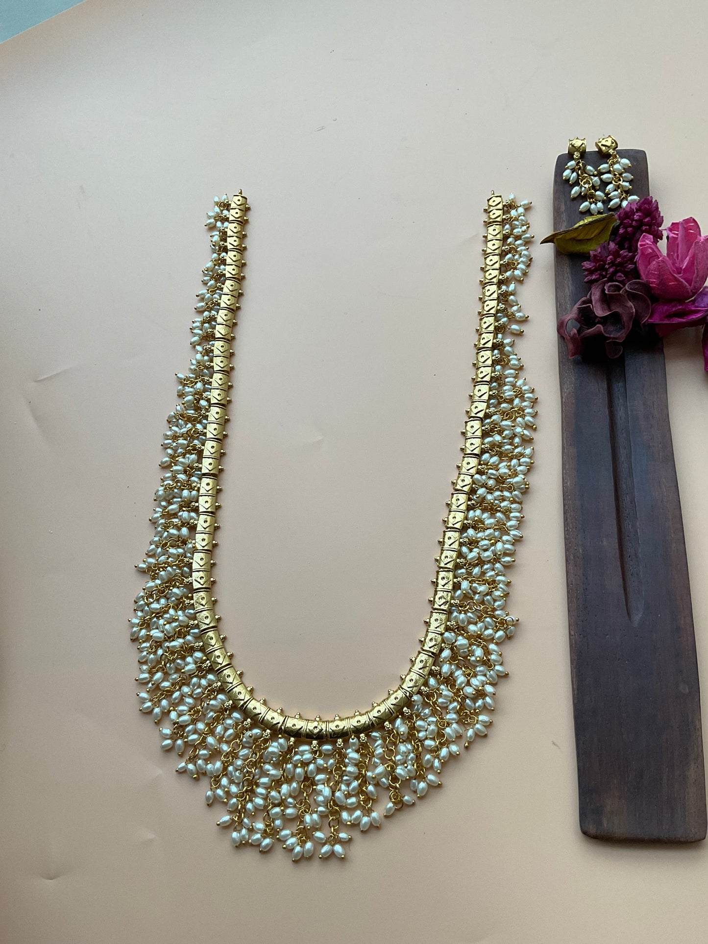 Rice pearls layered long harm