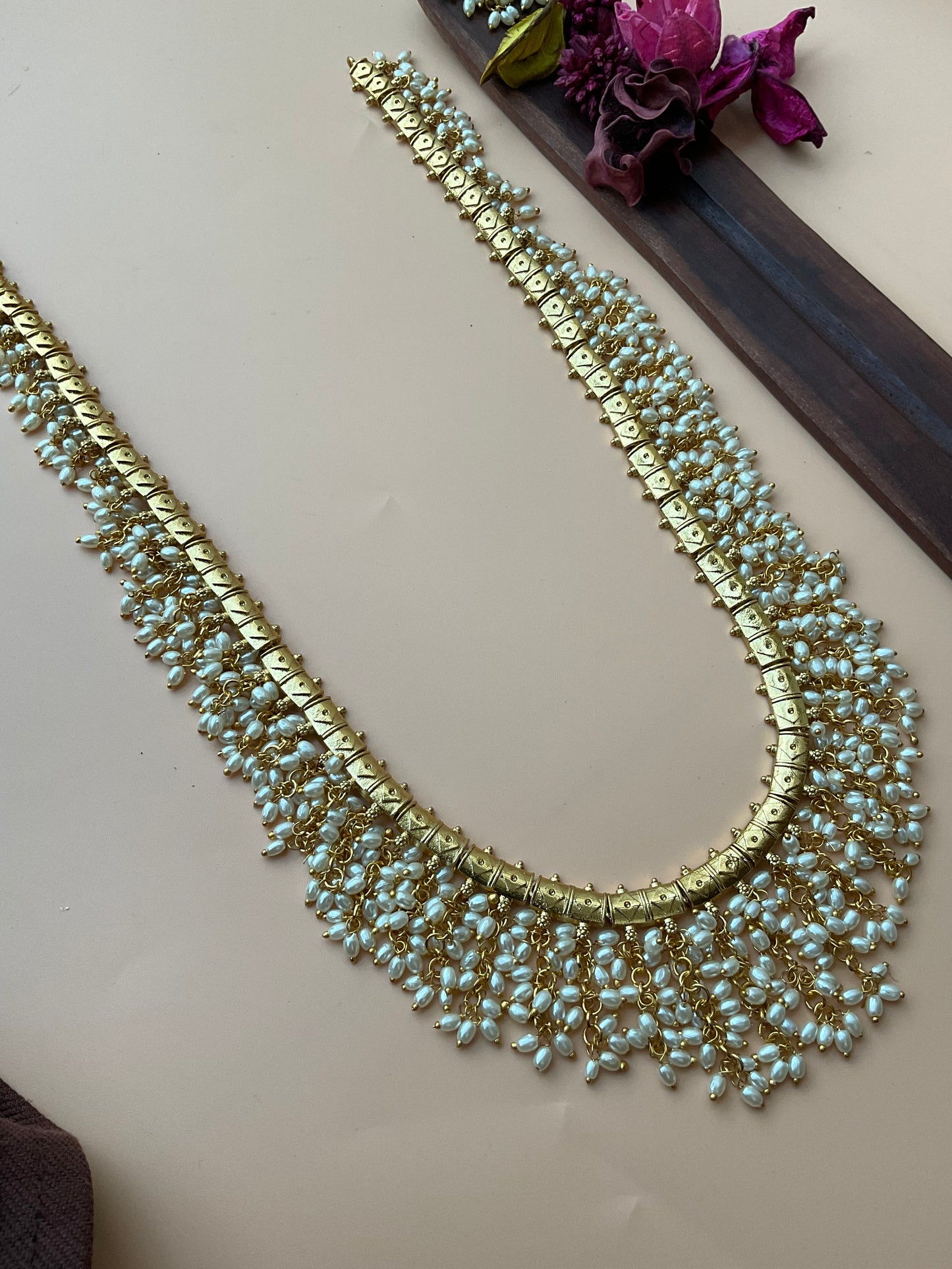 Rice pearls layered long harm